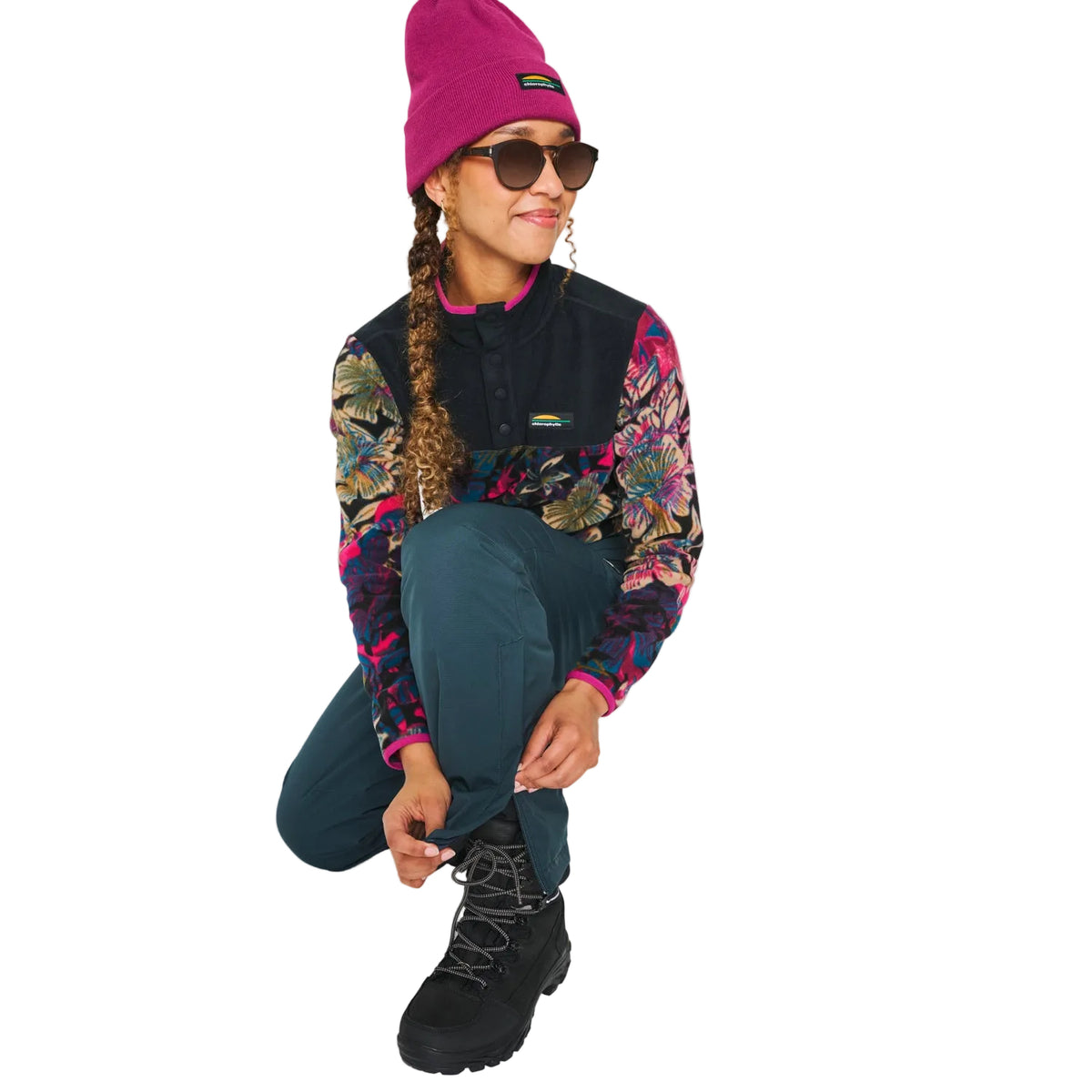 Pantalon de ski Monrovia de Chlorophylle pour femmes, turquoise, porté en position accroupie