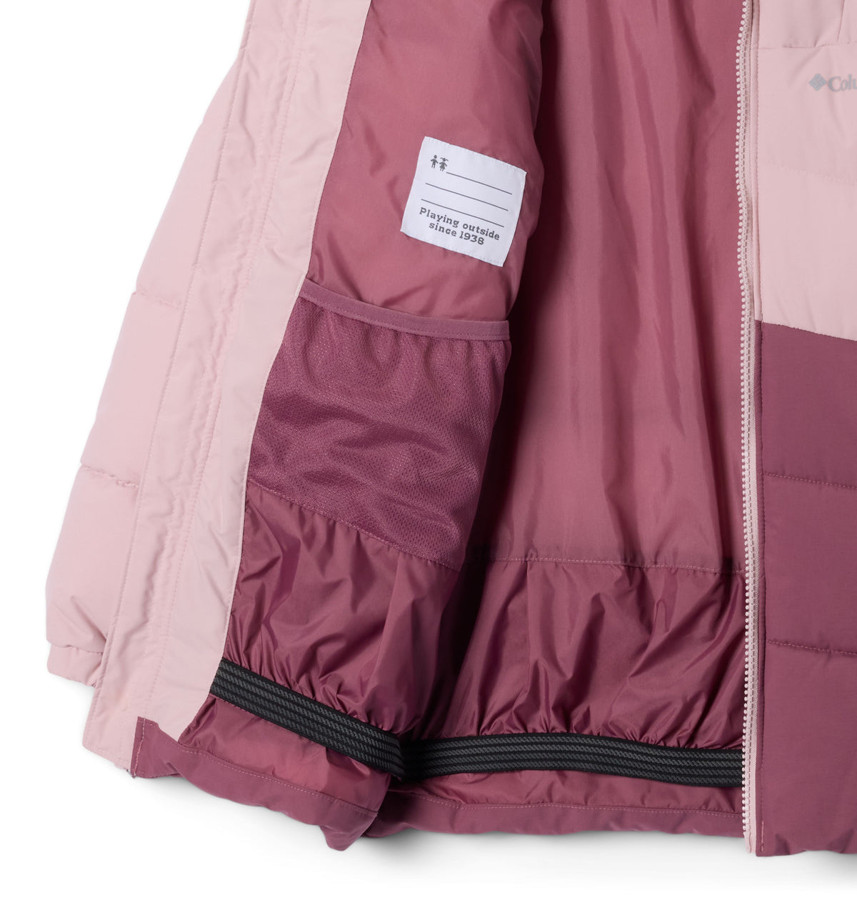 Manteau d'hiver Arctic Blast de Columbia pour filles junior, rose, détail de l'intérieur et de la jupe pare-neige