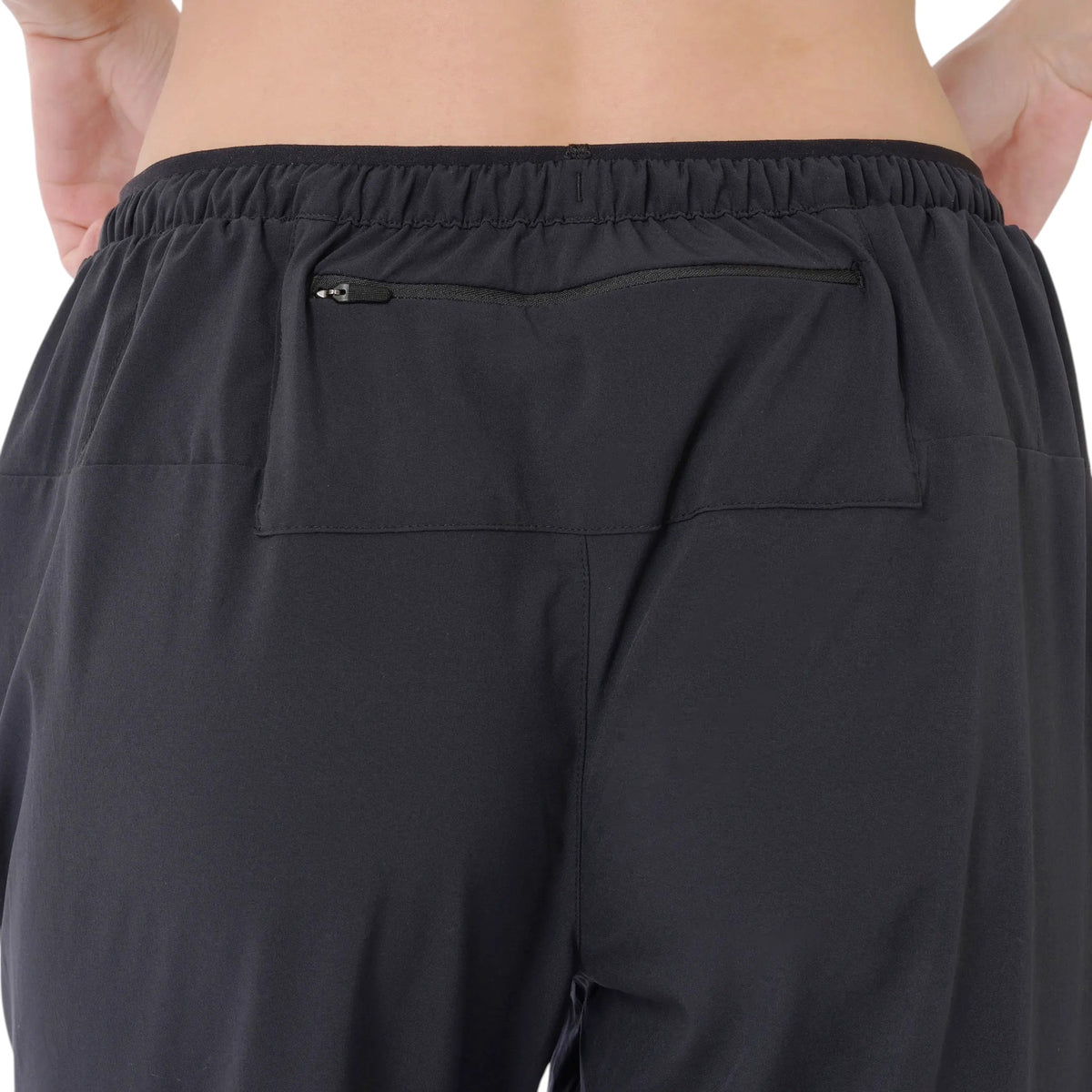 Poche zippée dans le dos de la taille du pantalon de jogging New Balance RC Essential noir pour femmes