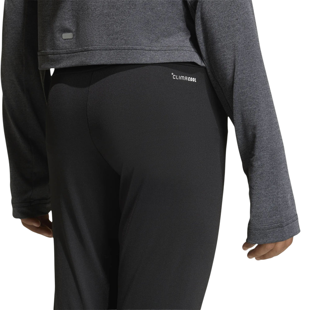 Legging Adidas Train Essentials noir pour filles, détail de l'étiquette CLIMACOOL à l'arrière