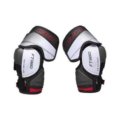 Coudières de hockey CCM JETSPEED FT880 senior, blanches et noires, paire vue de l'extérieur avec inscription FT880