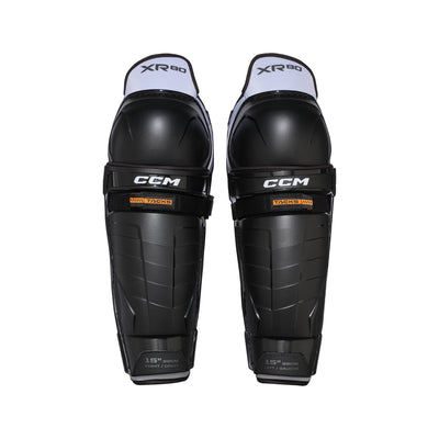 Jambières de hockey CCM TACKS XR80 pour adultes, noires, vue de face de la paire avec coques de genou et sangles