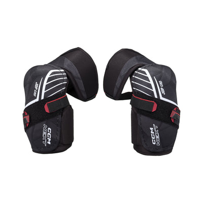 Coudières de hockey CCM Next 26 pour adultes, noir, paire avec coquille JDP cap, logo CCM NEXT et courroies à velcro