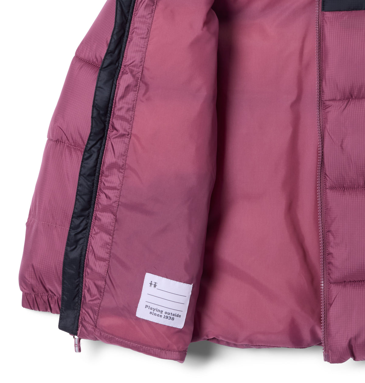 Manteau d'hiver Puffect II de Columbia pour filles, mauve et noir, détail de la doublure
