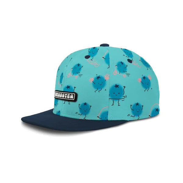 Casquette snapback Headster We Got Spirit pour filles juniors, turquoise à petits monstres bleus, visière marine, vue de côté