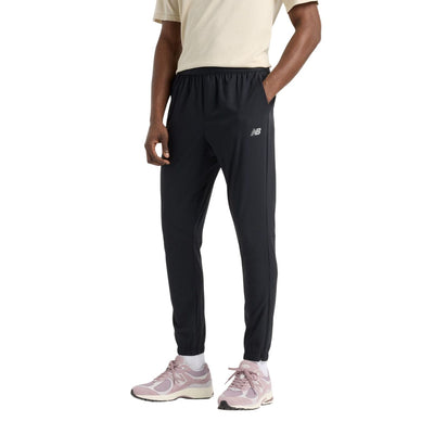 Pantalon sport New Balance pour hommes - AC WOVEN JOGGER
