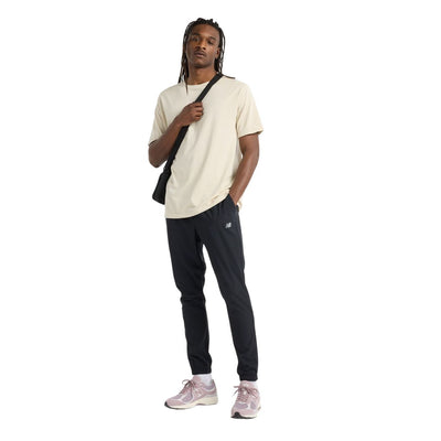 Pantalon sport New Balance pour hommes - AC WOVEN JOGGER