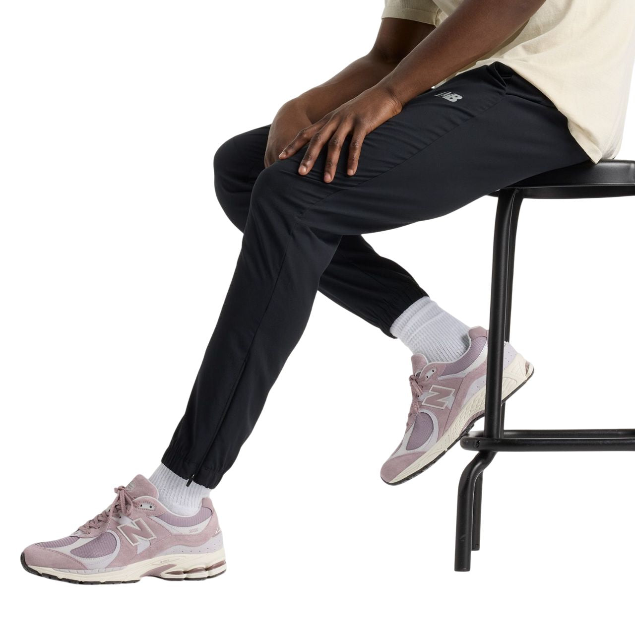 Pantalon sport New Balance pour hommes - AC WOVEN JOGGER