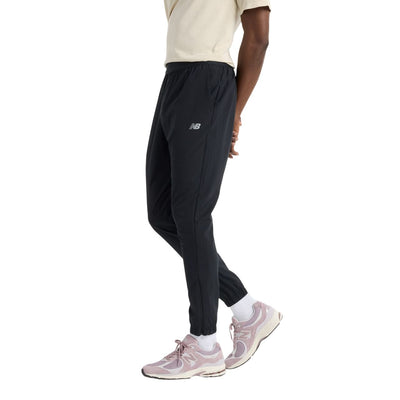 Pantalon sport New Balance pour hommes - AC WOVEN JOGGER
