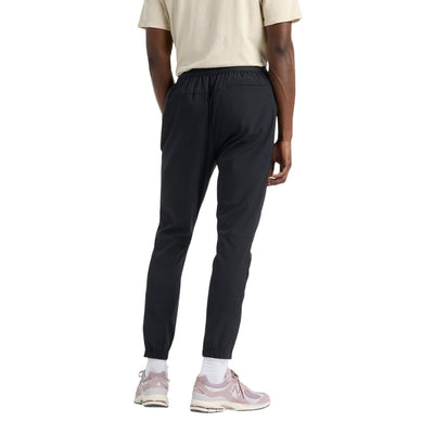 Pantalon sport New Balance pour hommes - AC WOVEN JOGGER