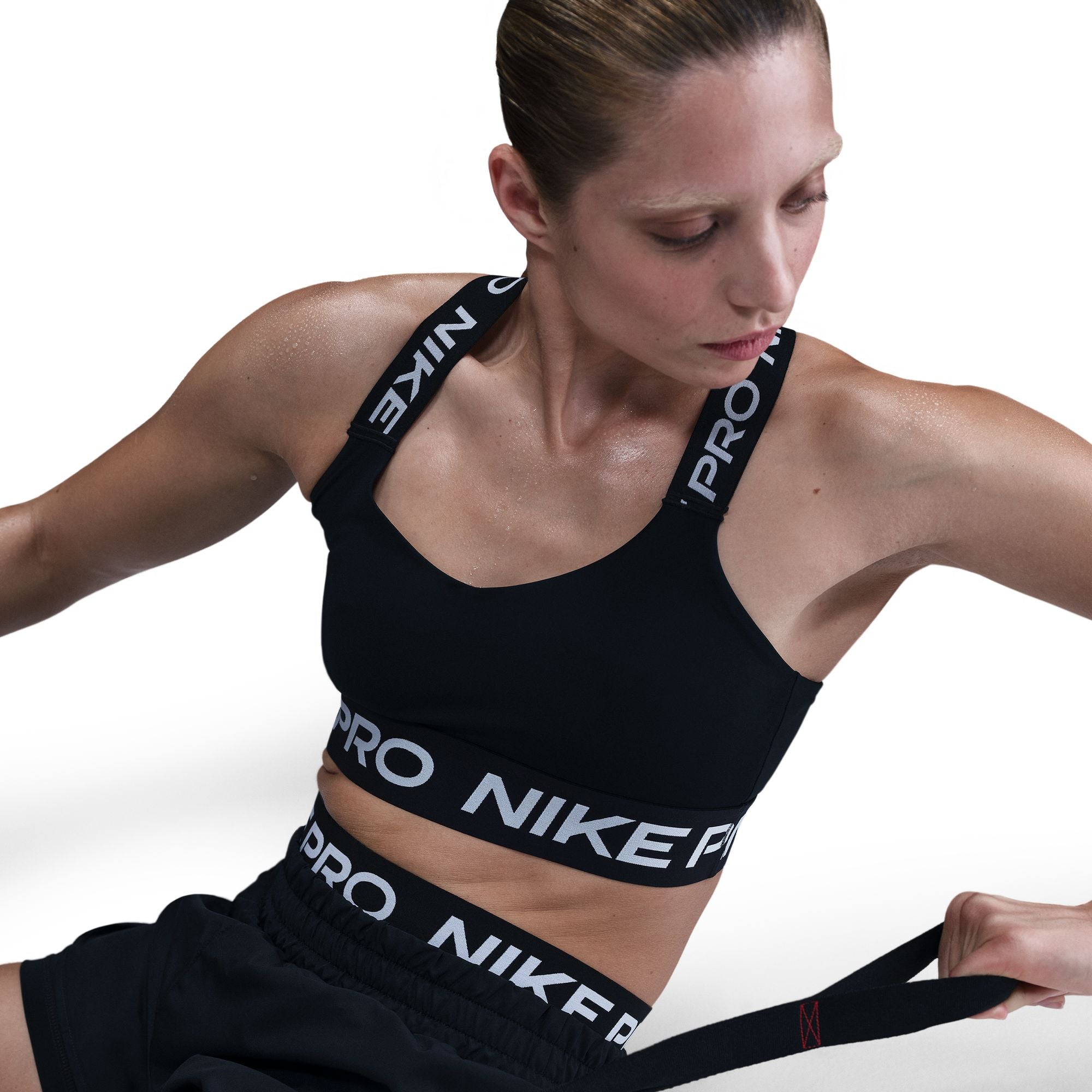 Top de sport pour femmes Nike - PRO MED SUP. BRA